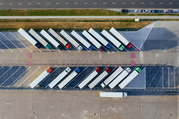 aerial view parked semi trucks